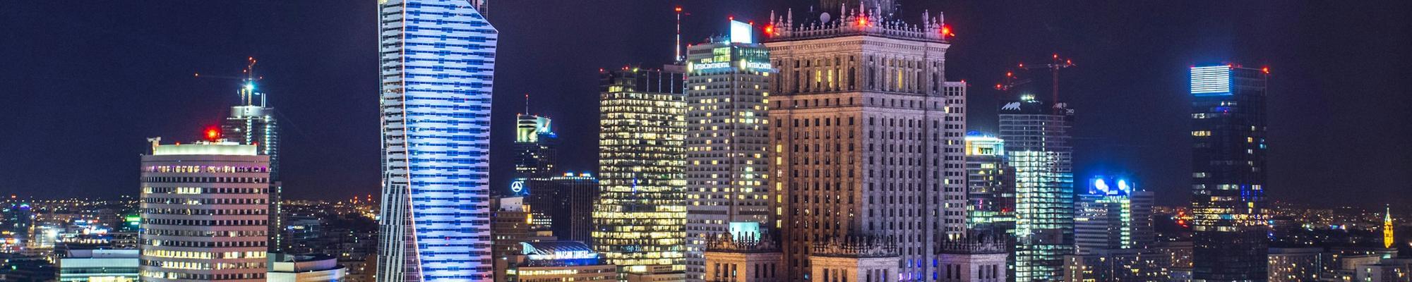 A photo of Warsaw by night